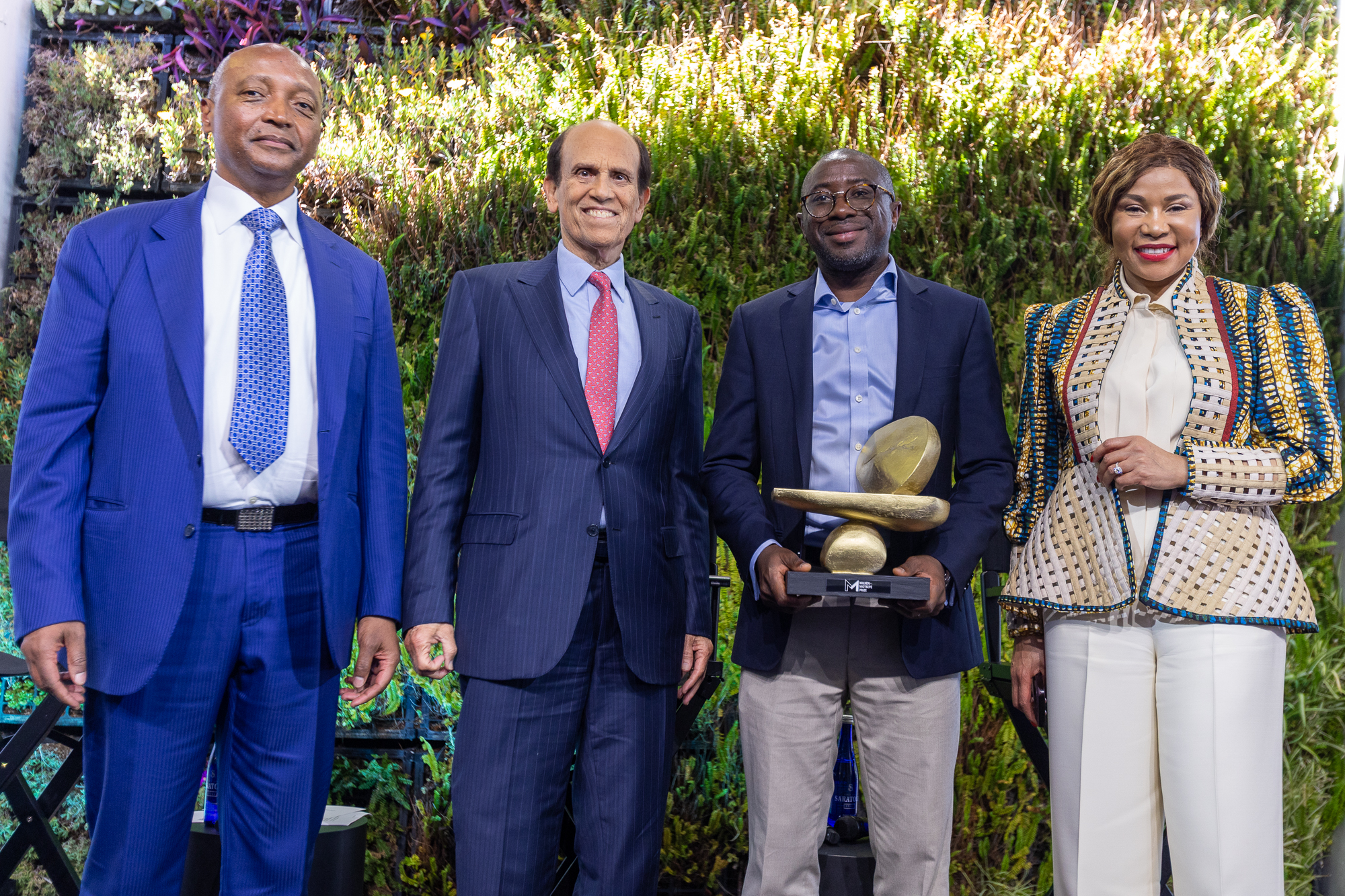 From left to right: Dr. Patrice Motsepe, Motsepe Foundation; Michael Milken, chairman, Milken Institute; Ola Oyetayo, CEO, Verto, FinTech grand prize winner; and Dr. Precious Moloi Motsepe, Motsepe Foundation.