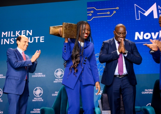Grand Prize winners of the Milken-Motsepe Prize in AgriTech, Otaigo Elisha (right) Diana Orembe (middle) from NovFeed, pictured with Executive Chairman of the Milken Institute Mike Milken (left)